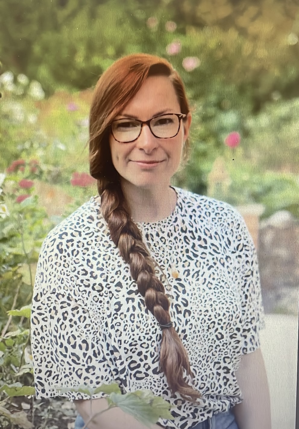 Jenni outdoors in a garden